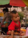 Very cute child at the next table as we had dinner on the edge of the Mekong River with a view of Thailand on the other side.